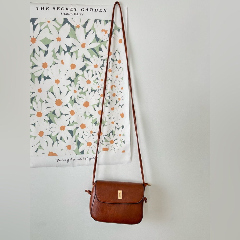 Compact Brown Crossbody Bag with Flap Closure